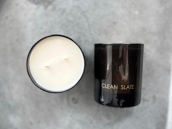 Barista espresso + coconut candle in a dark glass jar.