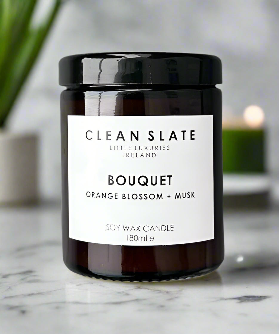 Bouquet Orange Blossom + Amber Candle in an Amber jar.