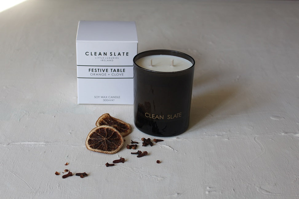 Festive Table Orange + Clove Moody Collection Candle with box.