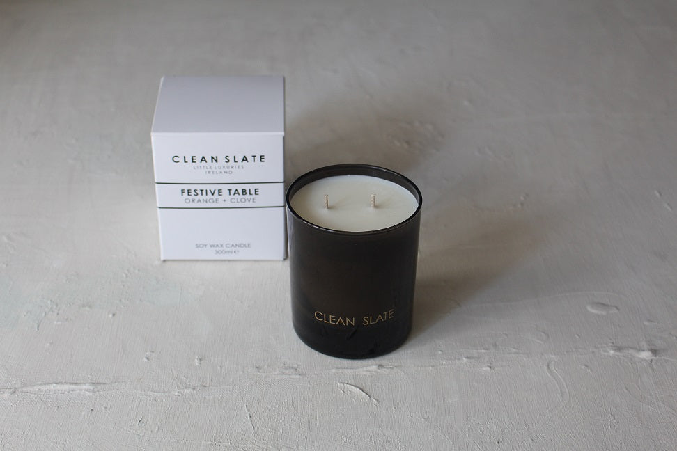 Festive Table Orange + Clove Moody Collection Candle with box.