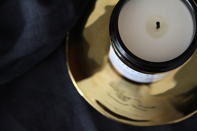 Golden Hour Saffron + Amber Candle in an Amber jar overhead.