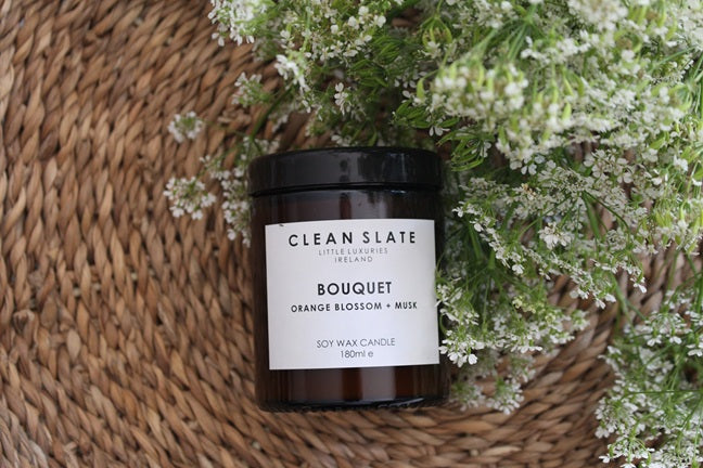 Bouquet Orange Blossom + Amber Candle in an Amber jar.