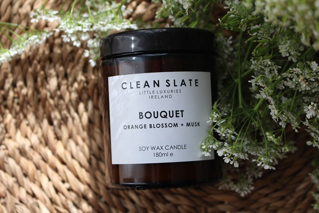 Bouquet Orange Blossom + Amber Candle in an Amber jar.