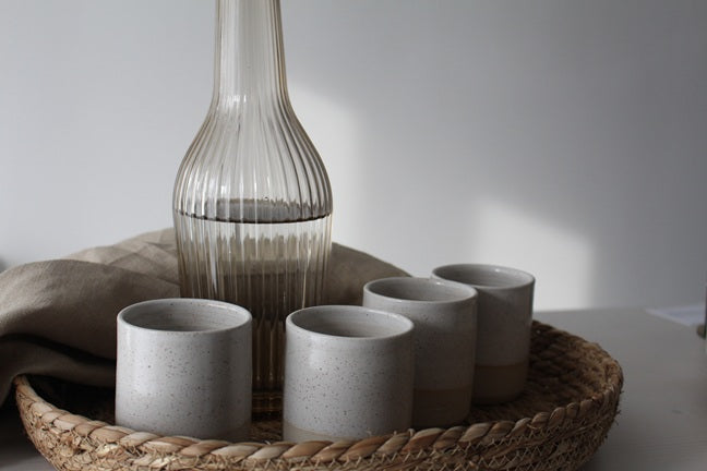 Little Luxe Pot Candle styled with jug of water.