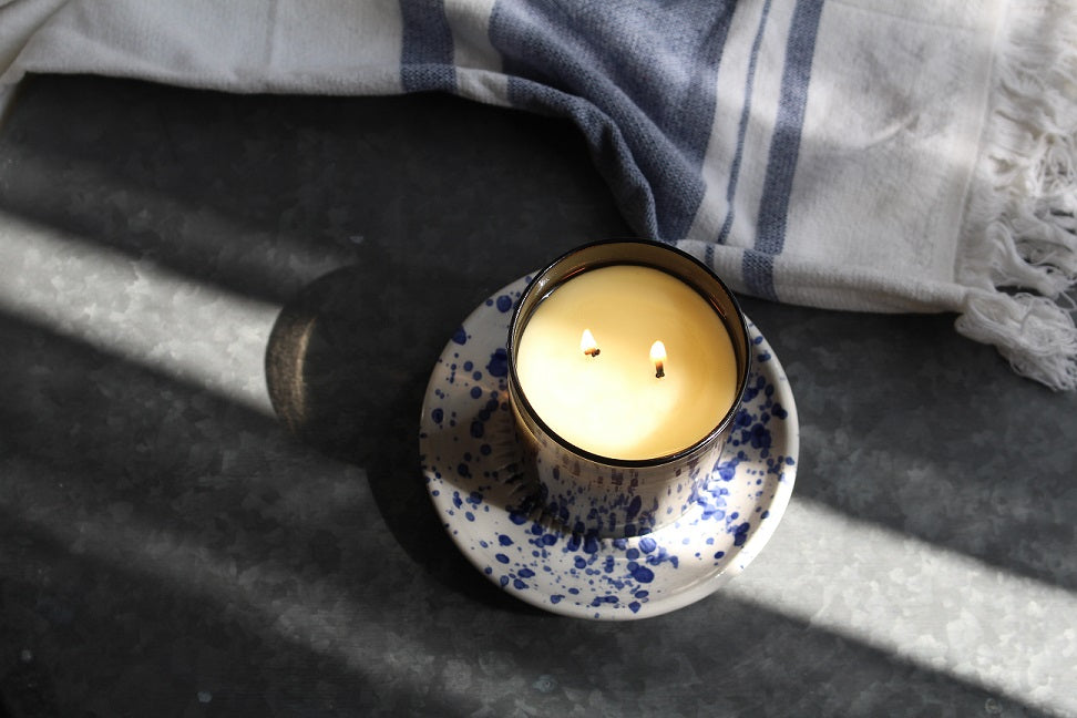 Soleil Honeysuckle + Coconut Moody Candle alight.