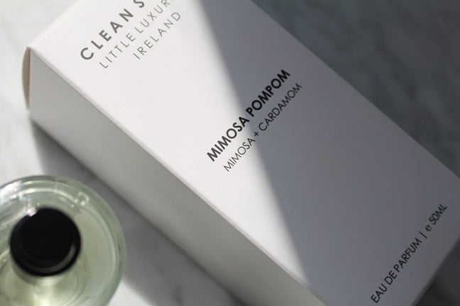 Close-up of Mimosa Pompom Eau De Parfum 50ML box with bottle.