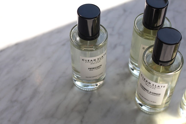 Close-up Petrichor Eau De Parfum 50ML bottle with other perfumes.